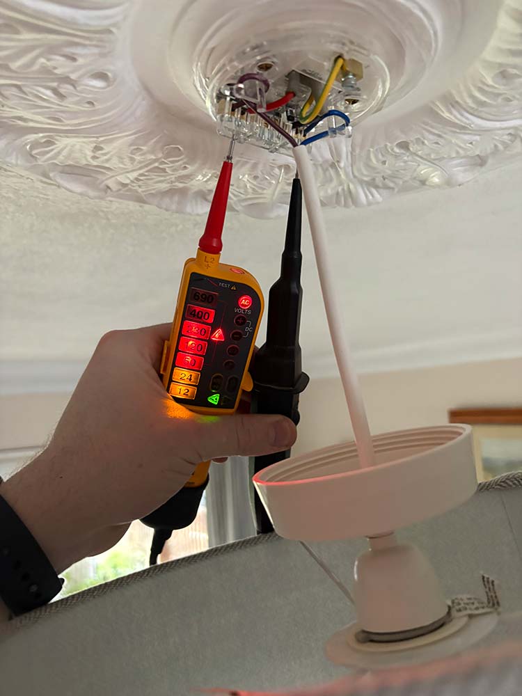 Voltage testing to trace electrical issue in ceiling light circuit