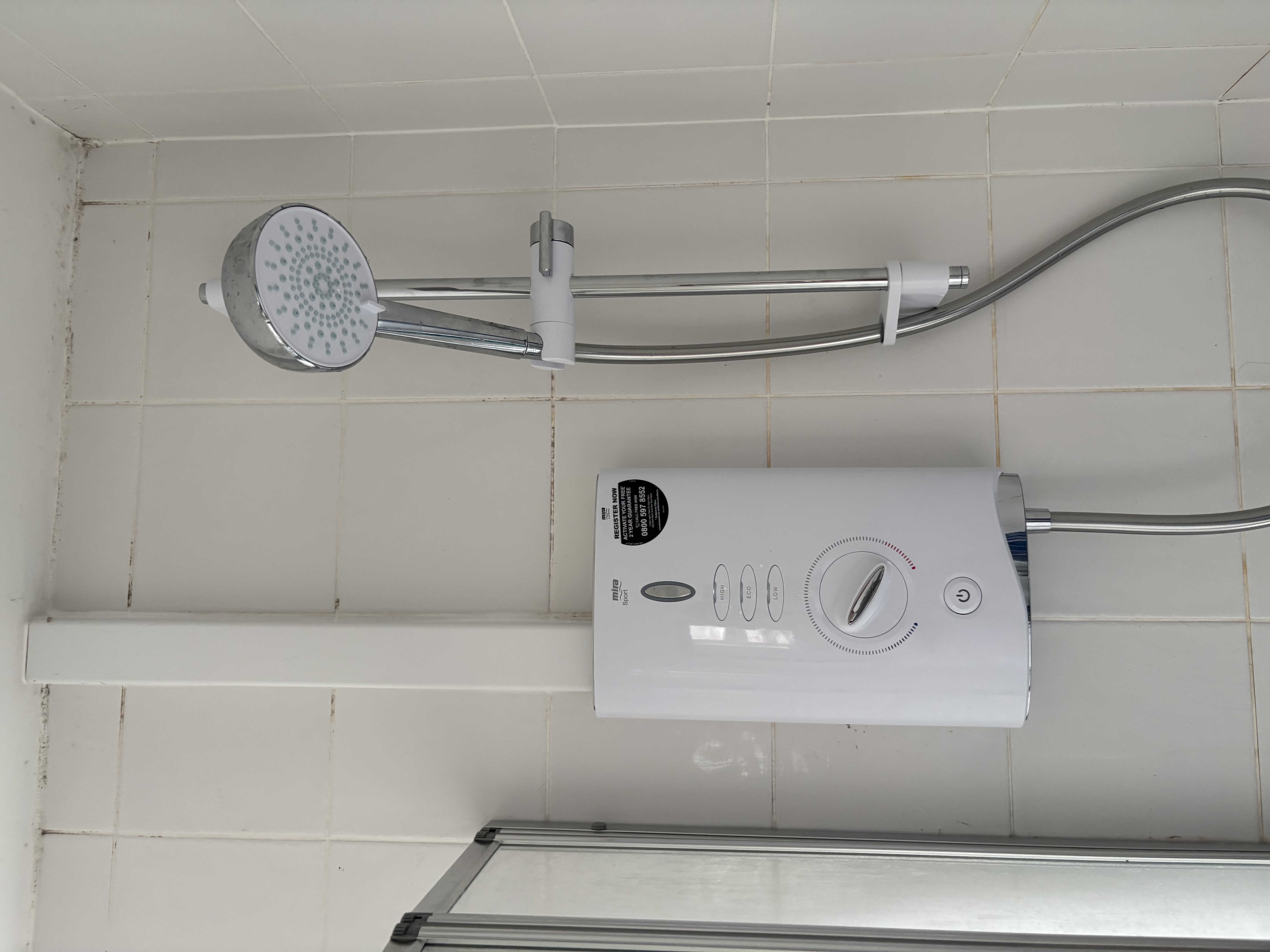 Electric shower fitting and shower head